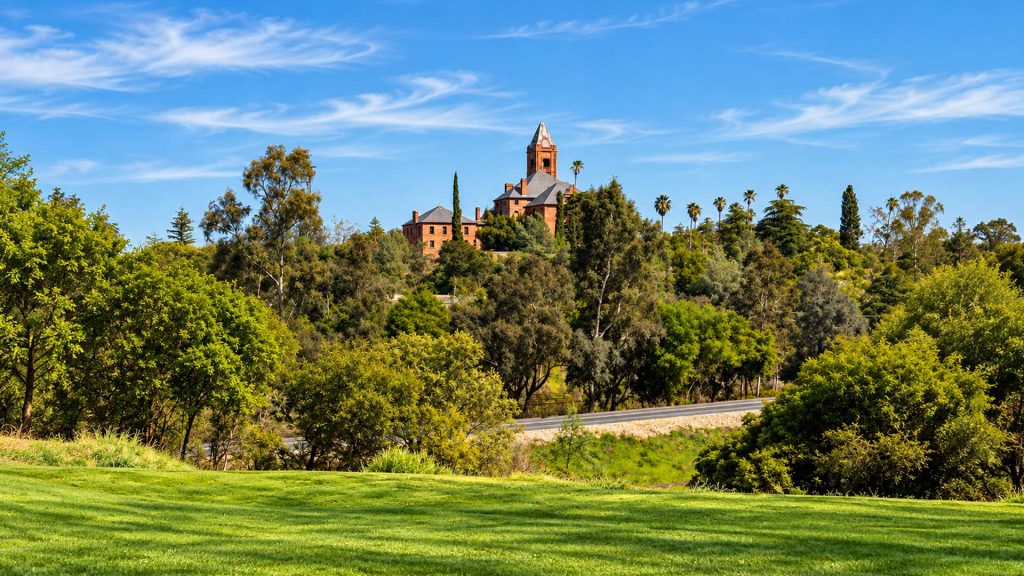 Historic Preston Castle overlooking the oak-covered hills near Castle Oaks Golf Club in Ione, California.
